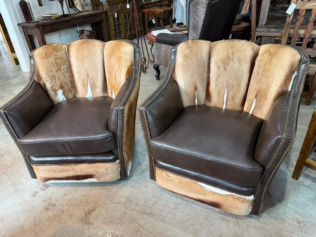 Western swivel chairs in Weatherford TX with cowhide channel backs and leather seats