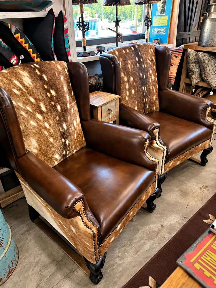 Western wingback chairs in Weatherford TX with axis deer hide backs and saddle leather